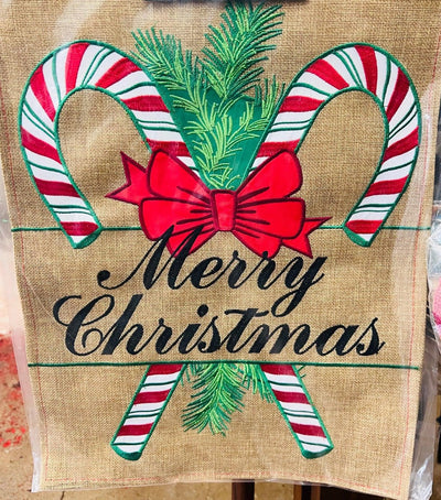 Candy canes and Merry Christmas on small burlap flag