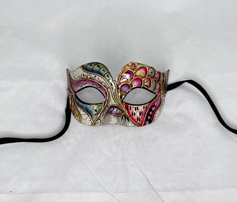Venetian style mask in subtle purples, reds, greens and silver