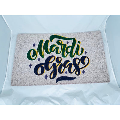 Mardi Gras doormat  in being with purple and green lettering